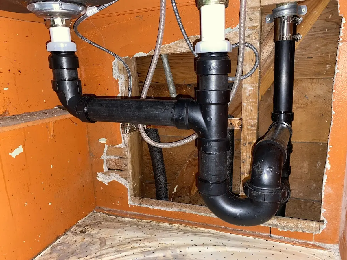 Professional Garbage Disposal Repair equipment and tools on the job in North Wildwood
